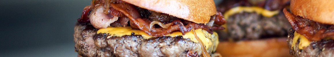 Eating American (Traditional) Burger at Zacadoo's Grille restaurant in Valdosta, GA.